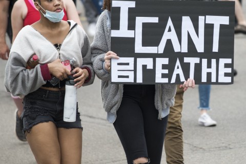 protester-holding-sign